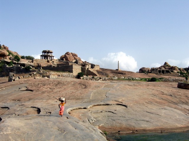 Rough landscapes with the color contrast of the Indian woman...almost apocalyptic